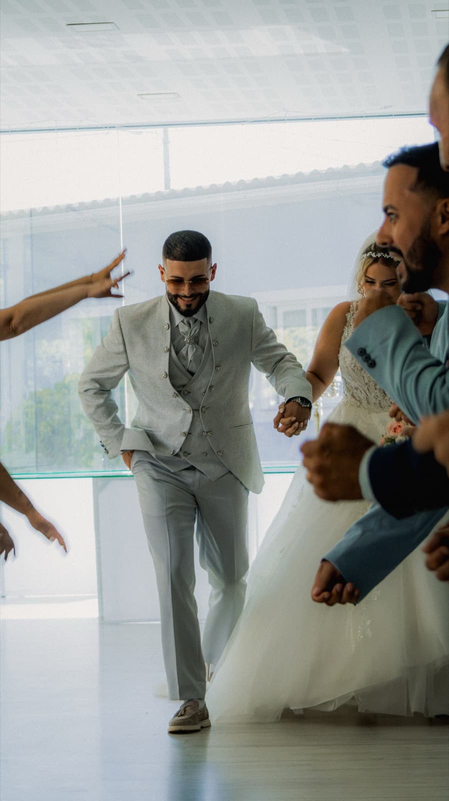 The couple laughing together on the dance floor