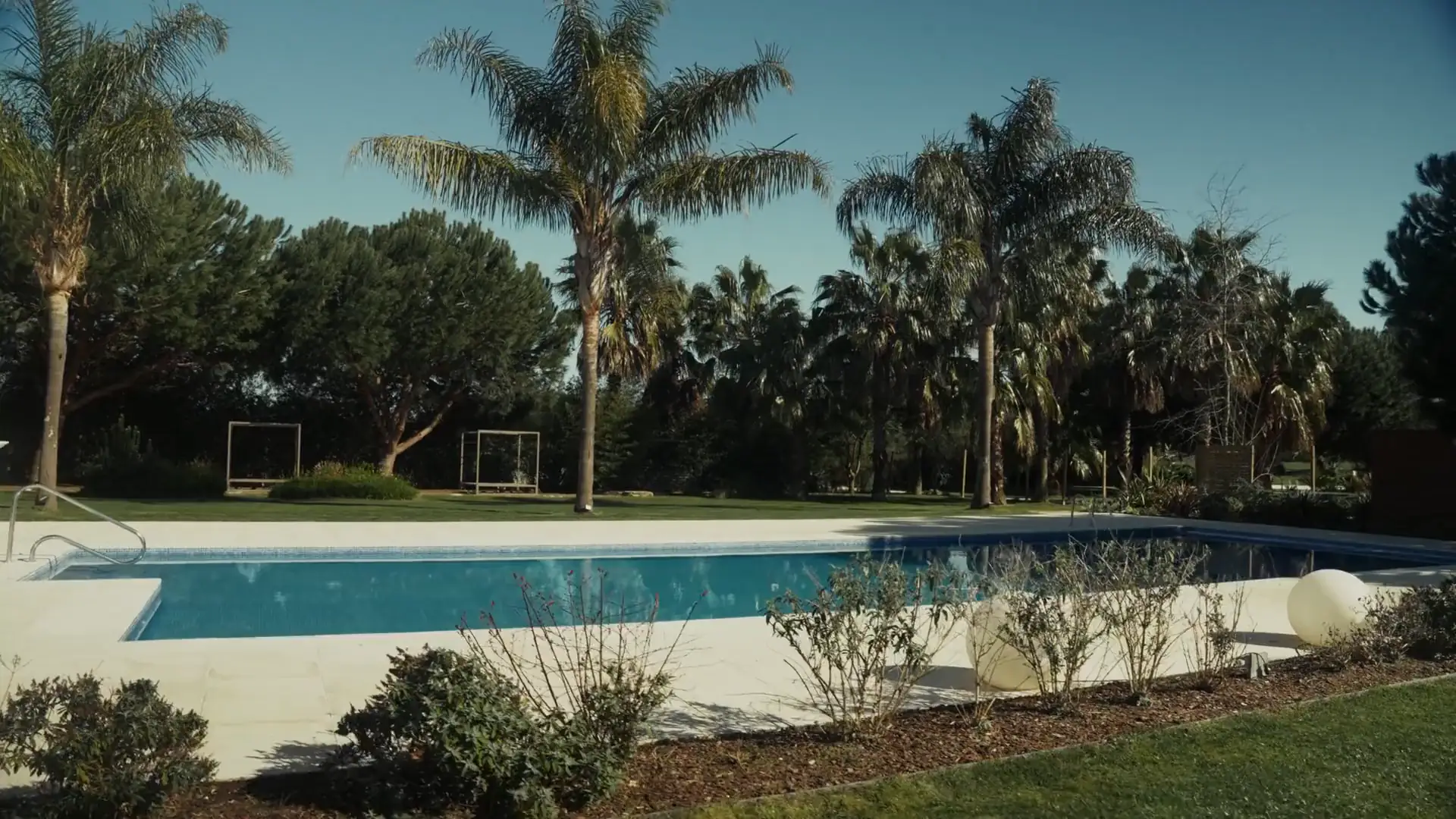 The pool and gardens at Sirius Park, in Montijo